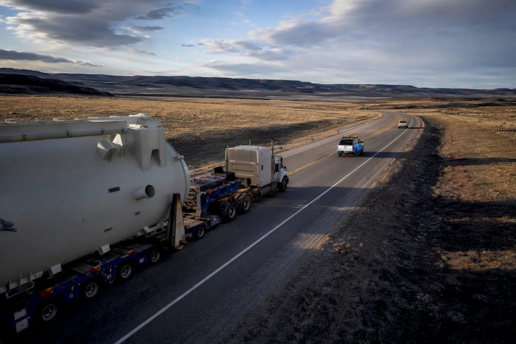 Oversized freight convoy crossing state lines