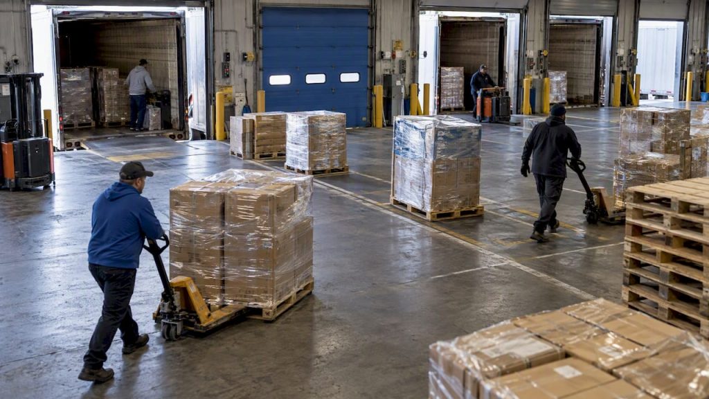 Freight staged between inbound and outbound trailers