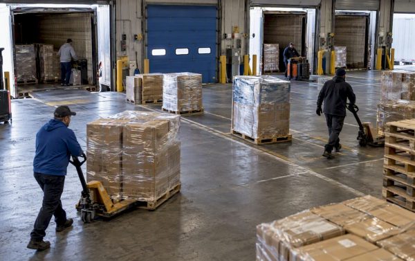 Freight staged between inbound and outbound trailers