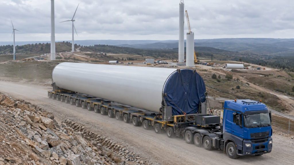 Wind turbine tower section on a modular trailer