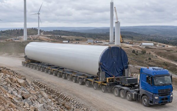 Wind turbine tower section on a modular trailer